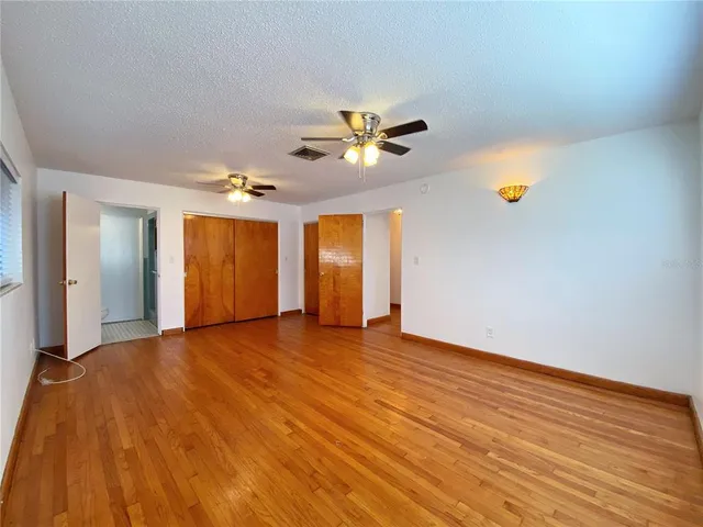 a bathroom with a toilet a sink and a shower