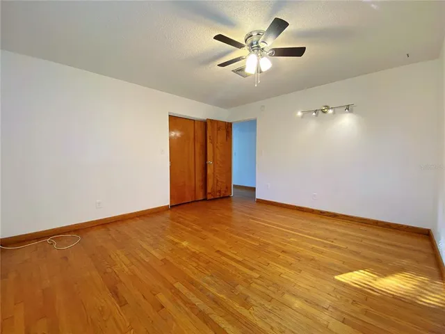 a view of a swimming pool with a house