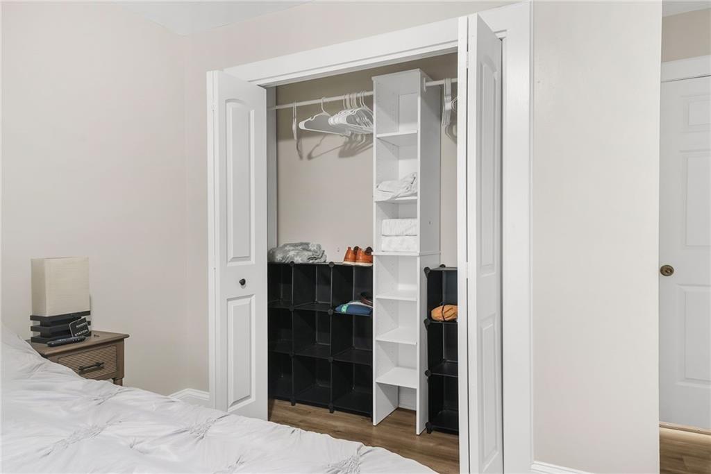 7445 Talbot Colony Northeast Atlanta, GA 30328 - Photo 35 of 41 a bathroom with a glass door shower and a sink