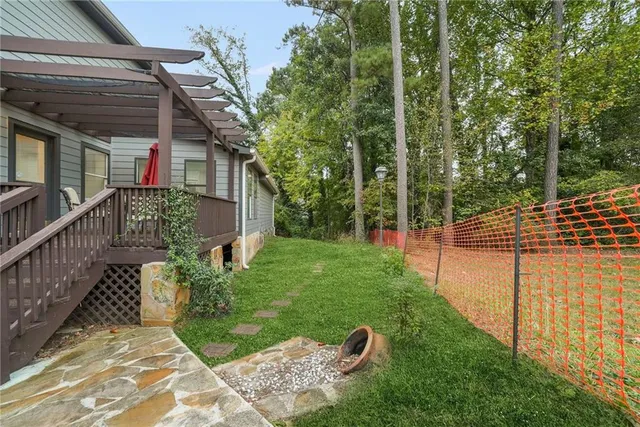 a view of a backyard with plants