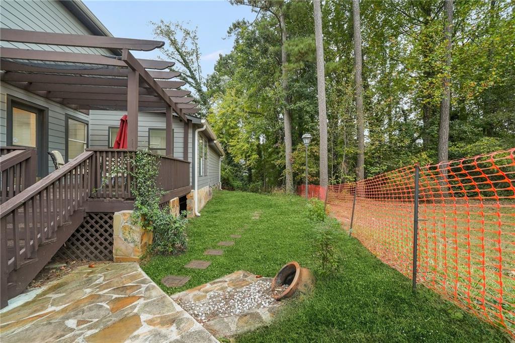 7445 Talbot Colony Northeast Atlanta, GA 30328 - Photo 39 of 41 a view of a backyard with plants