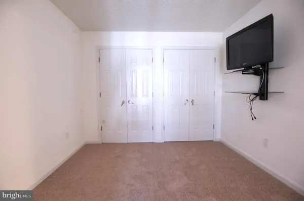 a view of a livingroom with a flat screen tv