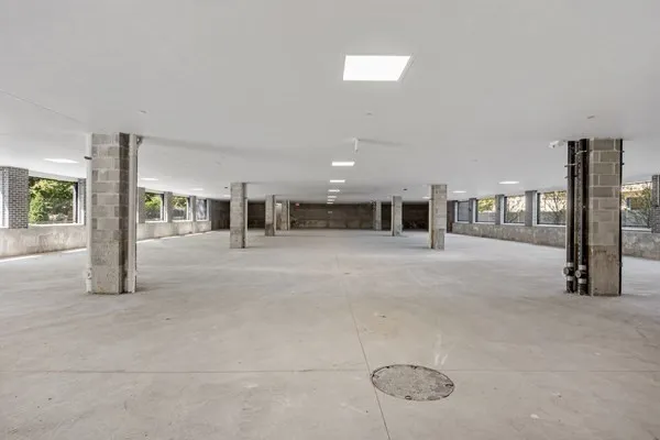 a lobby with furniture and window