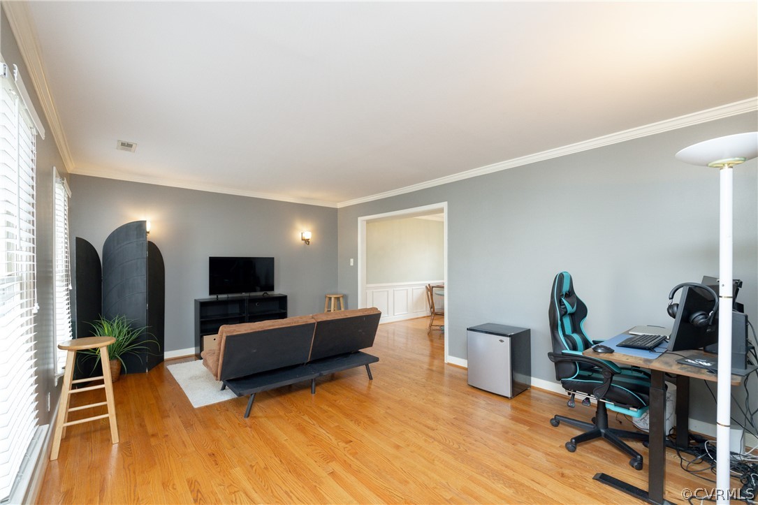 15205 Powell Grove Road Midlothian, VA 23112 - Photo 5 of 47 a living room with furniture and a flat screen tv