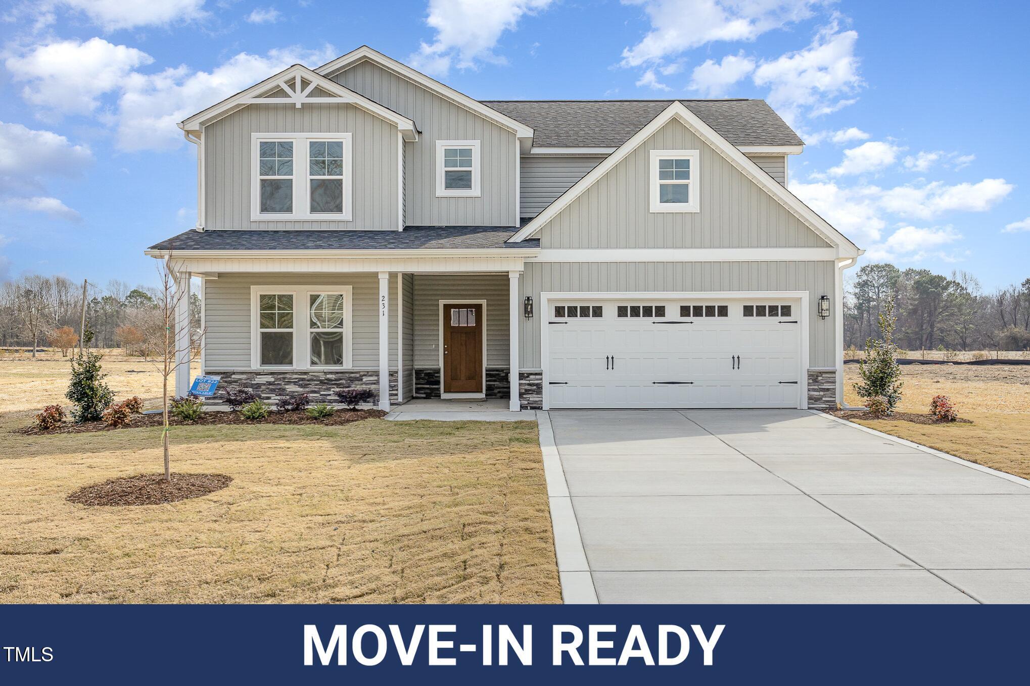 231 Trescott Street Smithfield, NC 27577 - Photo 1 of 28 a view of a house with swimming pool