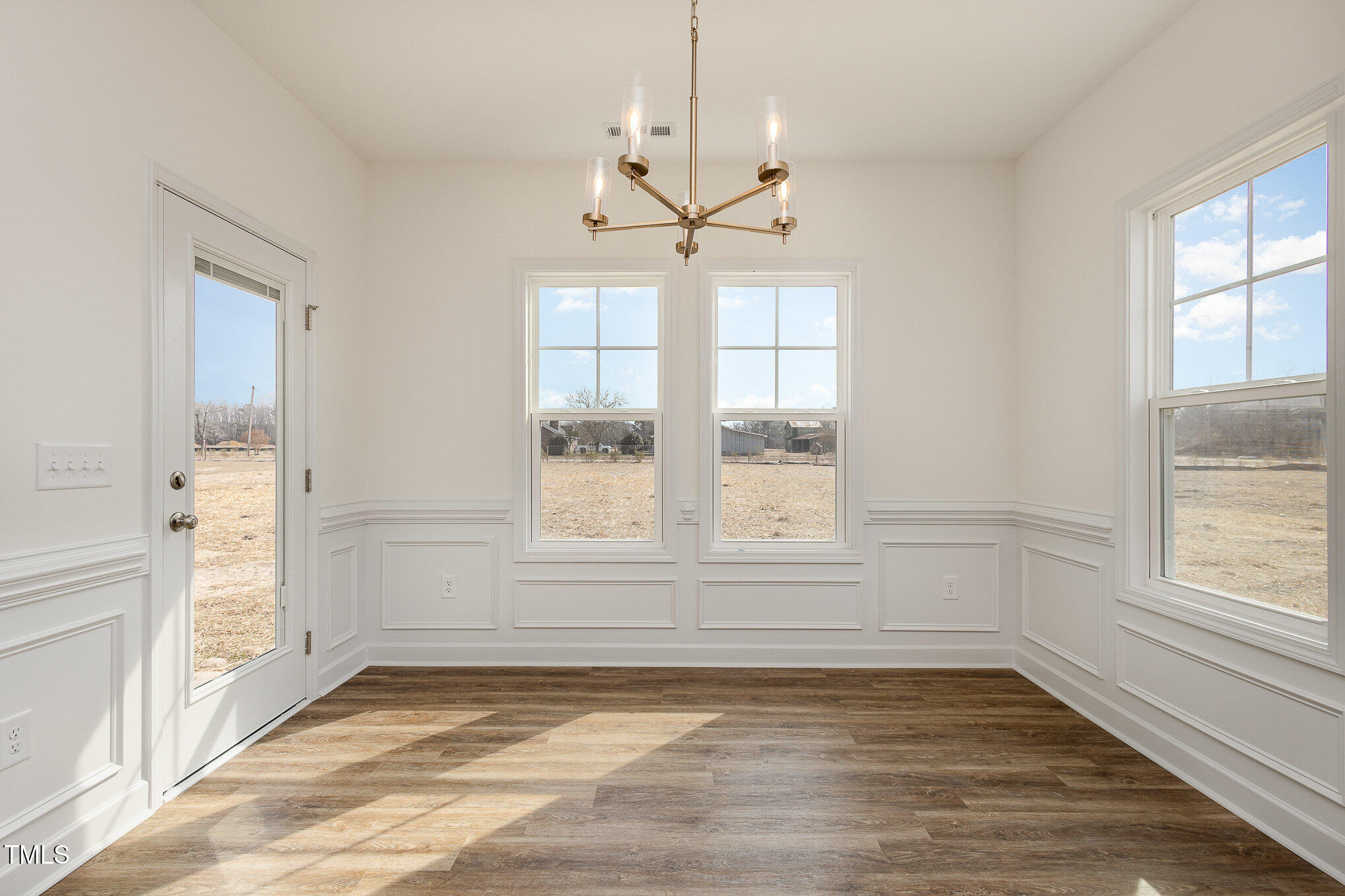 231 Trescott Street Smithfield, NC 27577 - Photo 12 of 28 a view of an empty room with a window