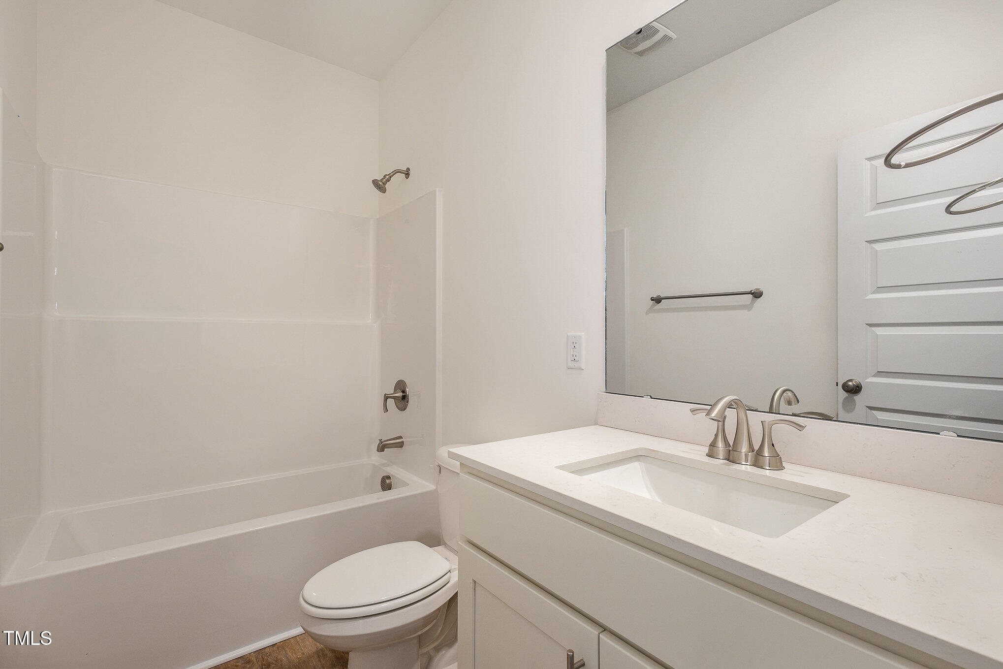 231 Trescott Street Smithfield, NC 27577 - Photo 14 of 28 a bathroom with a sink toilet and shower