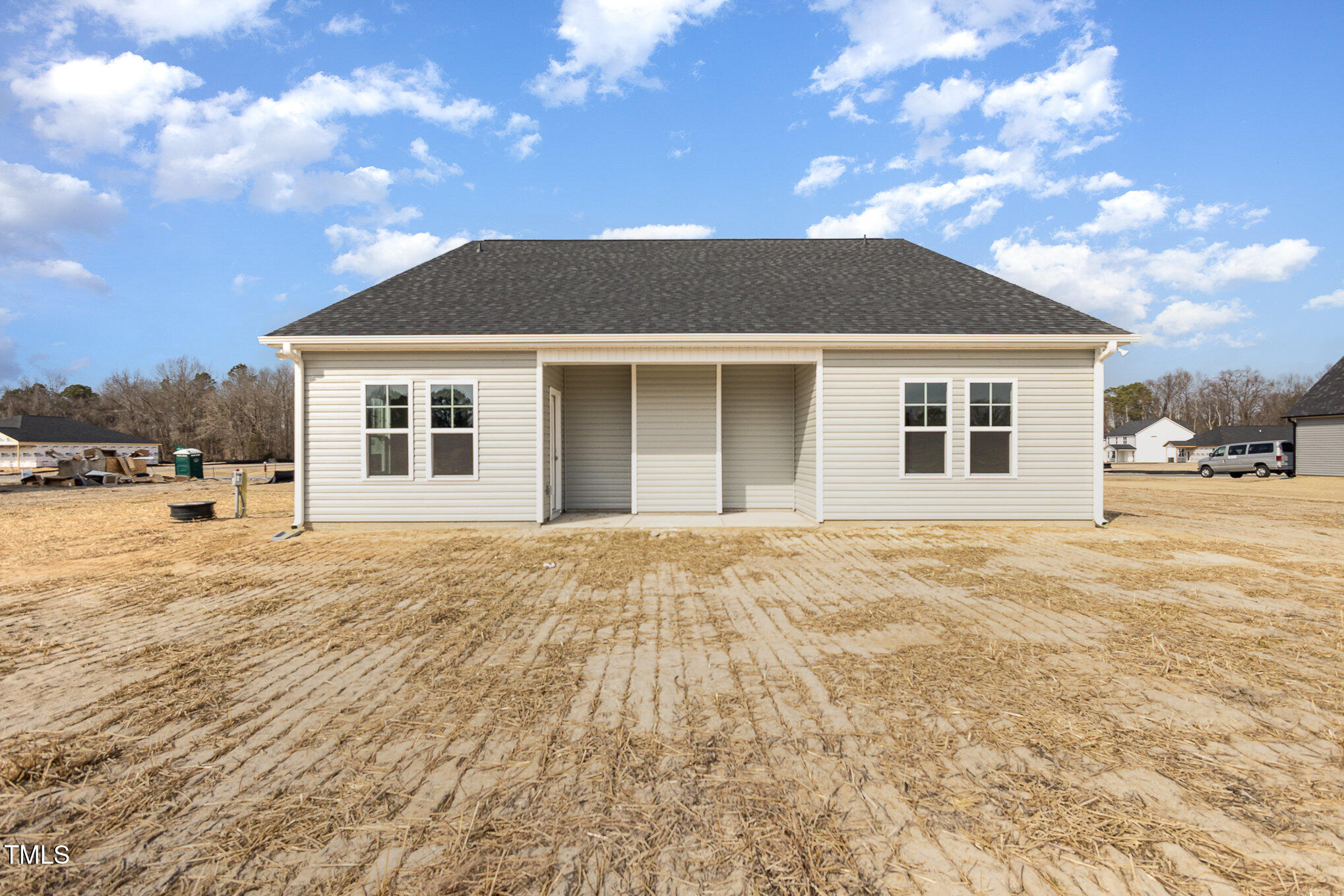 231 Trescott Street Smithfield, NC 27577 - Photo 27 of 28 a house with yard in front of it