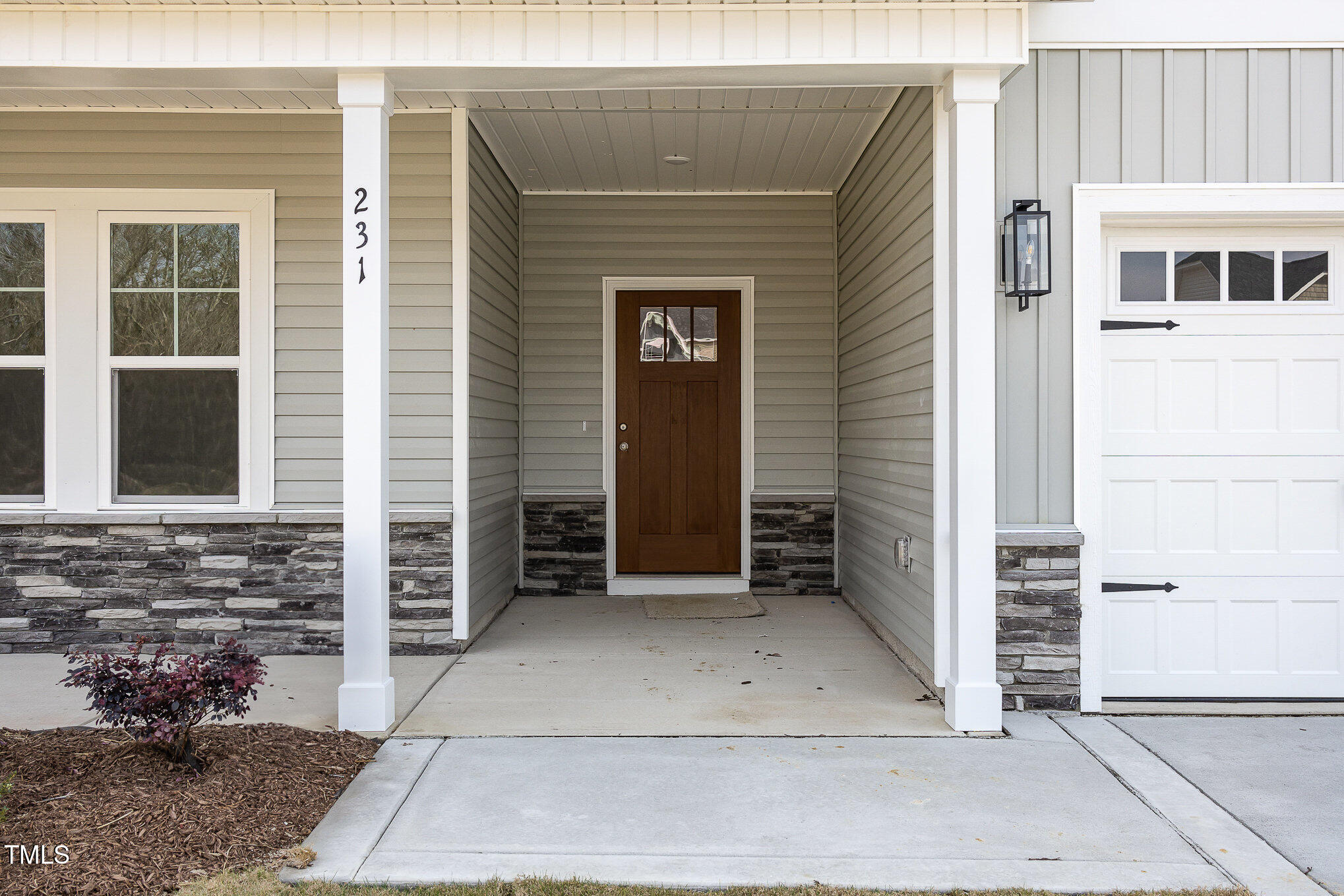 231 Trescott Street Smithfield, NC 27577 - Photo 4 of 28 a view of house with a outdoor space