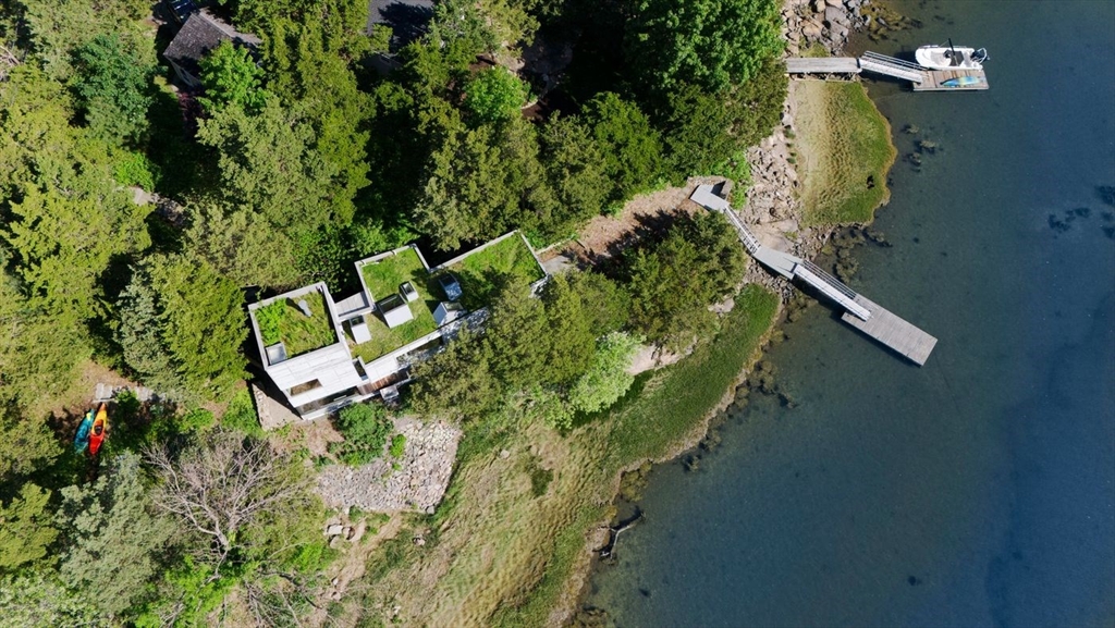 45 Lufkin Point Road Essex, MA 01929 - Photo 25 of 30 an aerial view of a house with a yard and lake view