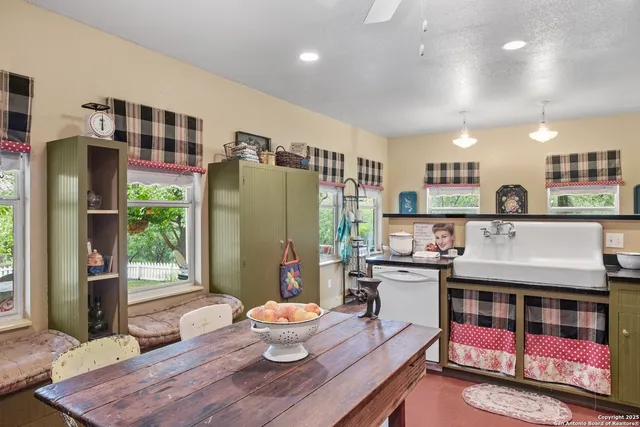 a bedroom with a bed and a table