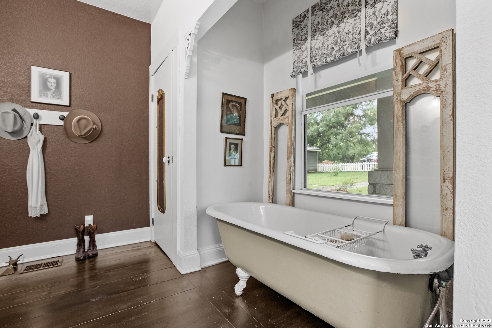 211 Riverside Drive West Llano, TX 78643 - Photo 30 of 74 a bathroom with a sink and a mirror