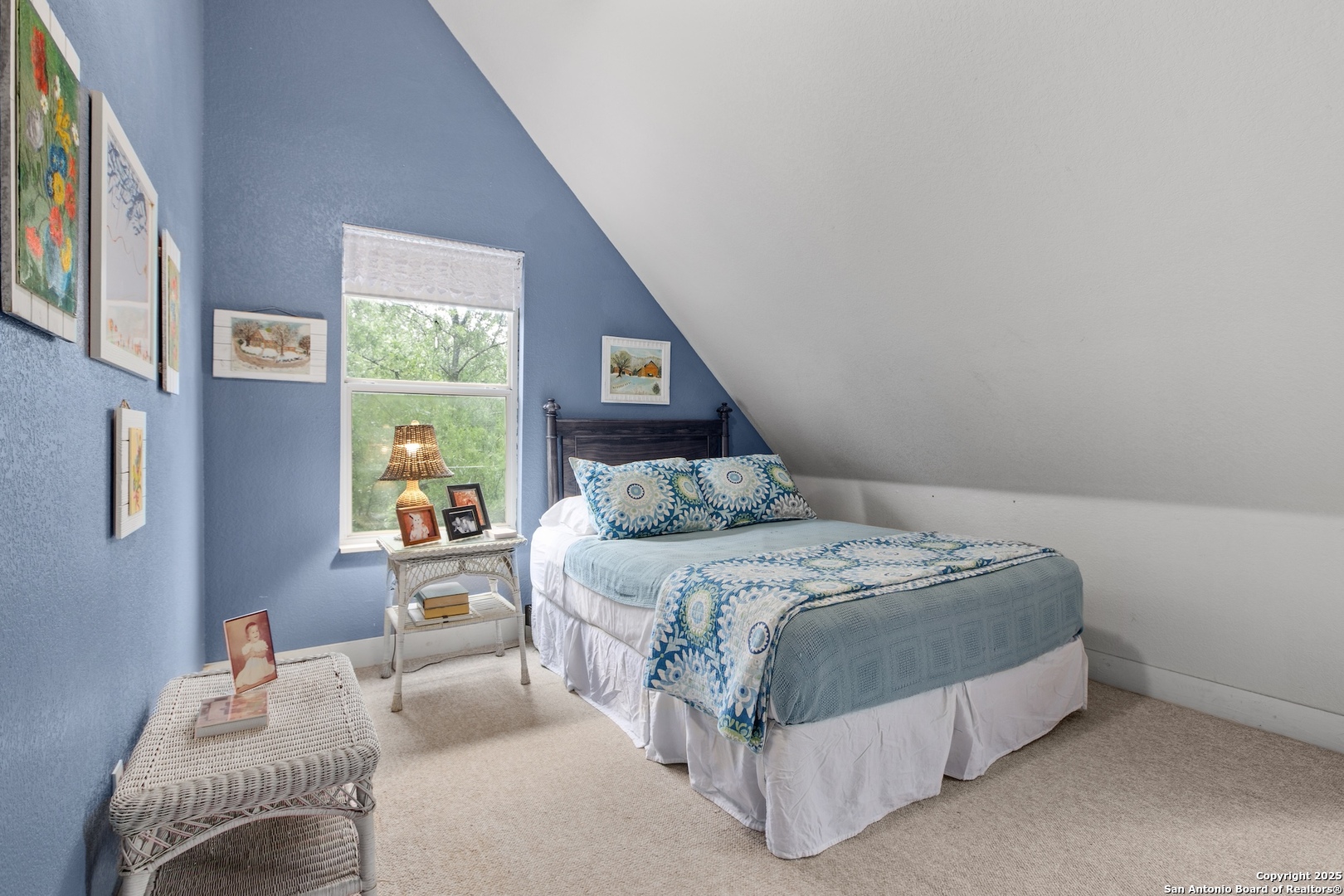 211 Riverside Drive West Llano, TX 78643 - Photo 49 of 74 a bed sitting in a bedroom next to a window