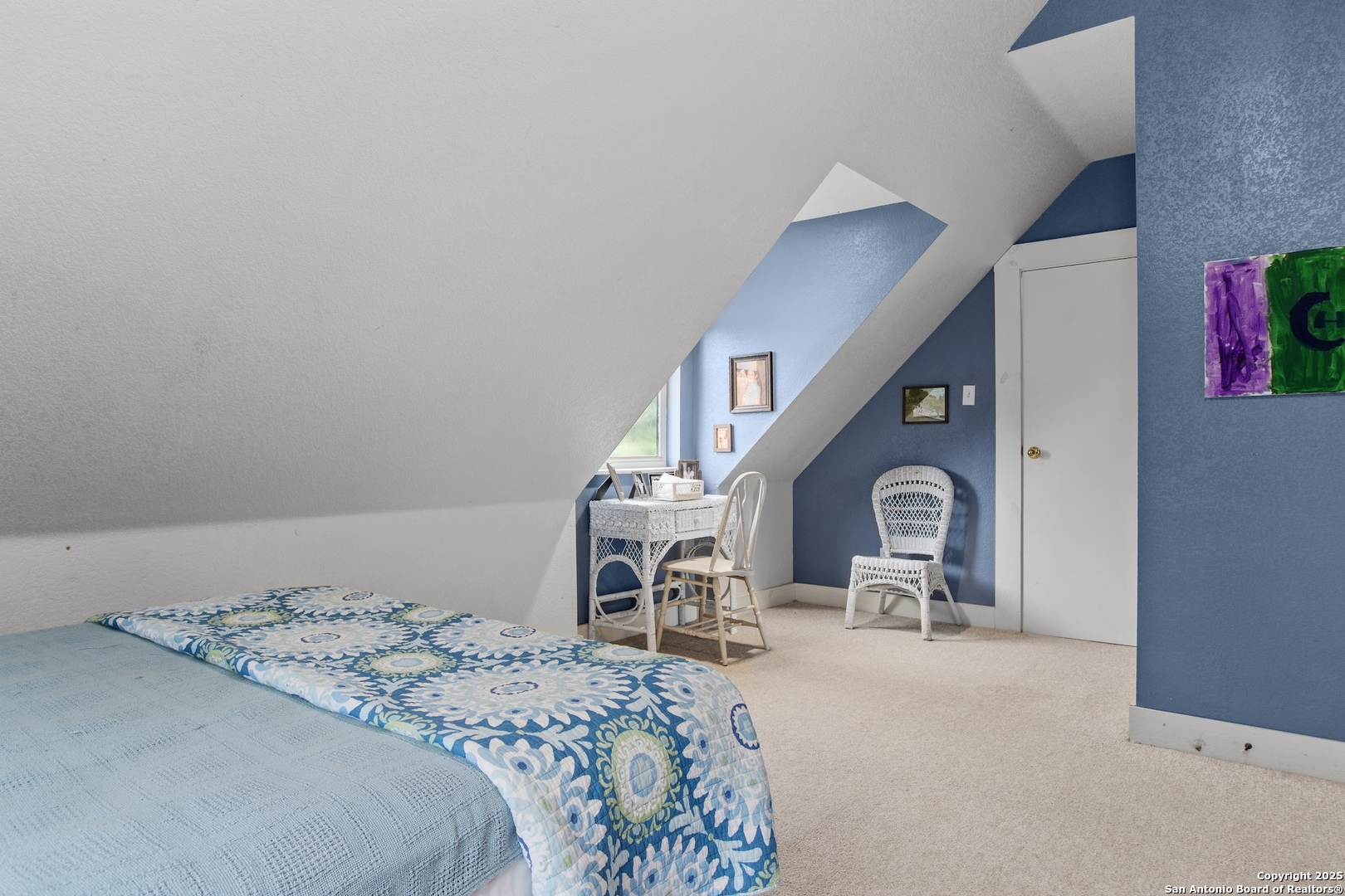 211 Riverside Drive West Llano, TX 78643 - Photo 50 of 74 a bedroom with a bed and a mirror on the dresser