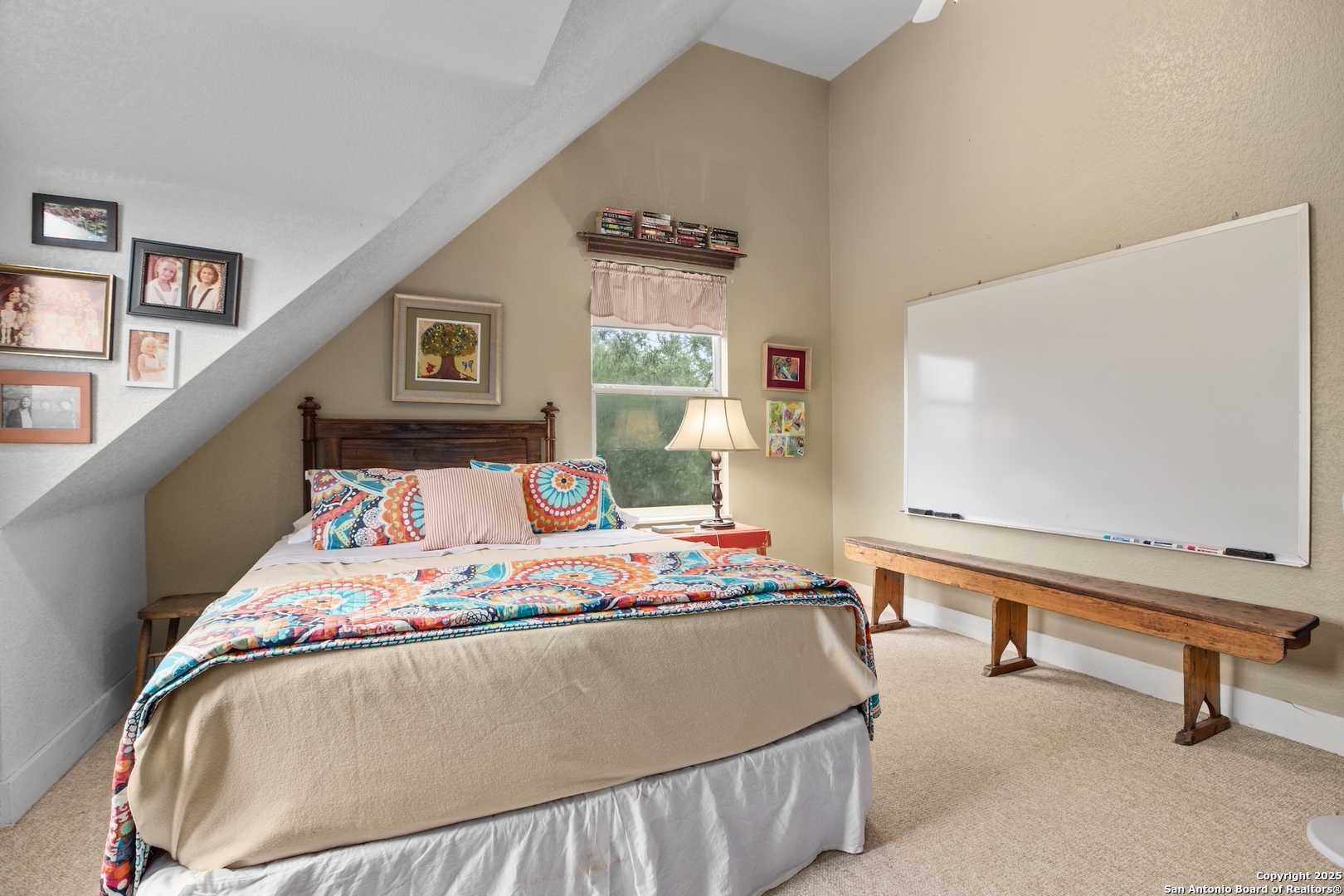 211 Riverside Drive West Llano, TX 78643 - Photo 51 of 74 a bedroom with a bed and a window