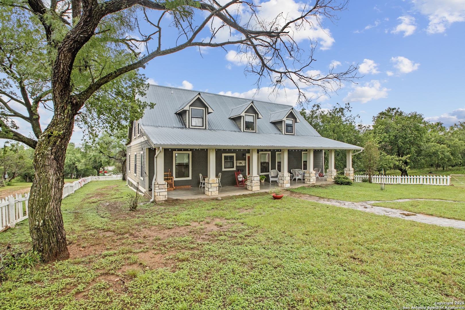 211 Riverside Drive West Llano, TX 78643 - Photo 63 of 74 a front view of a house with garden