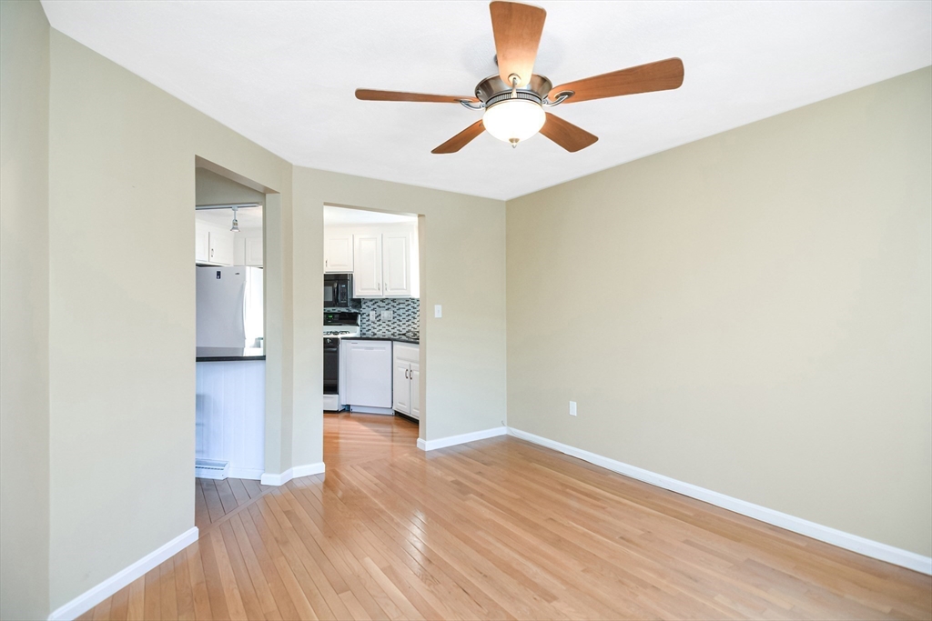 90 Mountain Gate Road, Unit 90 Ashland, MA 01721 - Photo 13 of 29 a view of a kitchen with a sink and a refrigerator