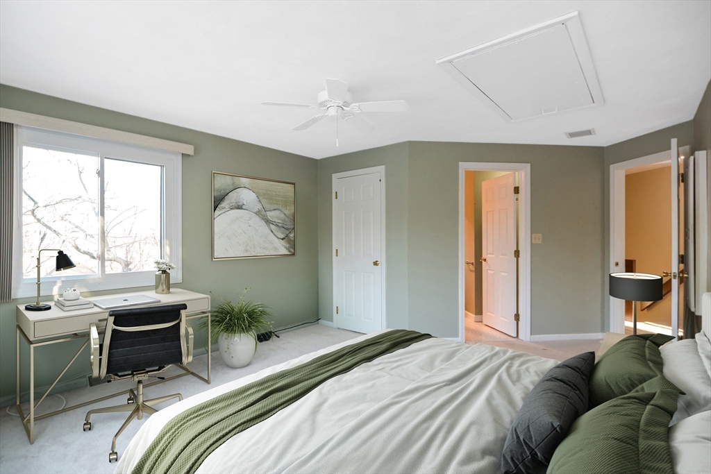 90 Mountain Gate Road, Unit 90 Ashland, MA 01721 - Photo 22 of 29 a bedroom with a bed and a window