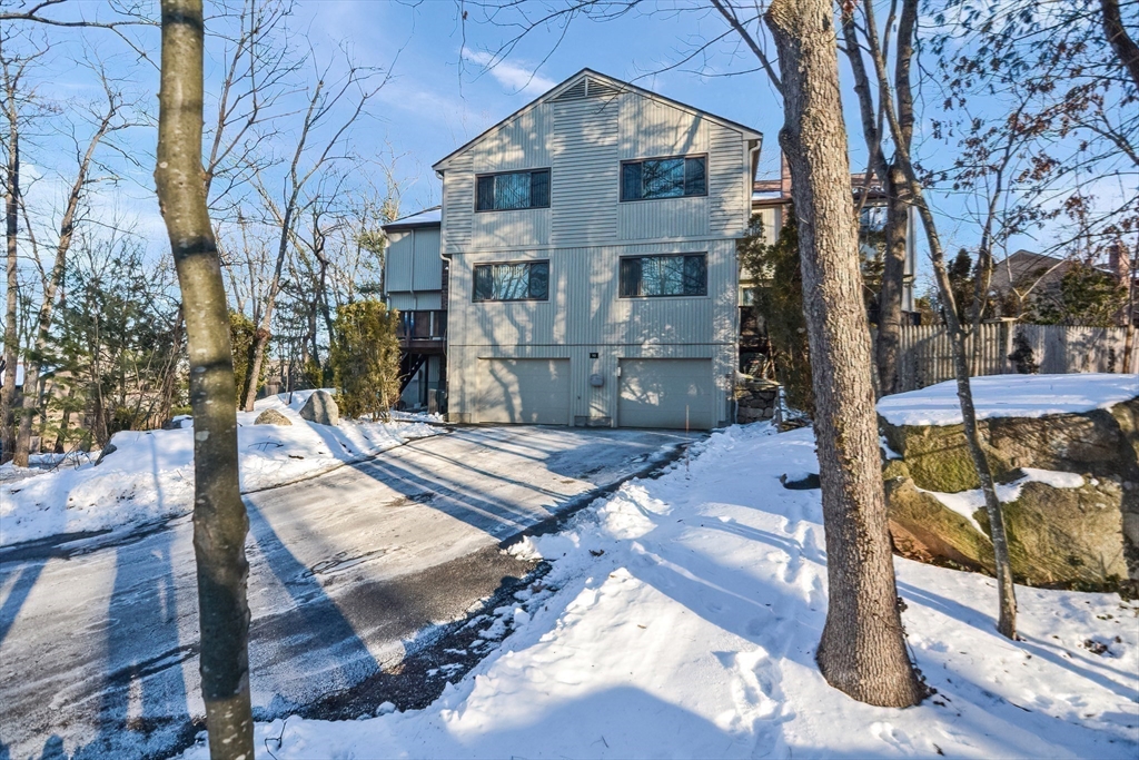 90 Mountain Gate Road, Unit 90 Ashland, MA 01721 - Photo 27 of 29 a view of a house with yard