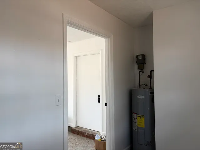 a close view of kitchen sink with wooden floor