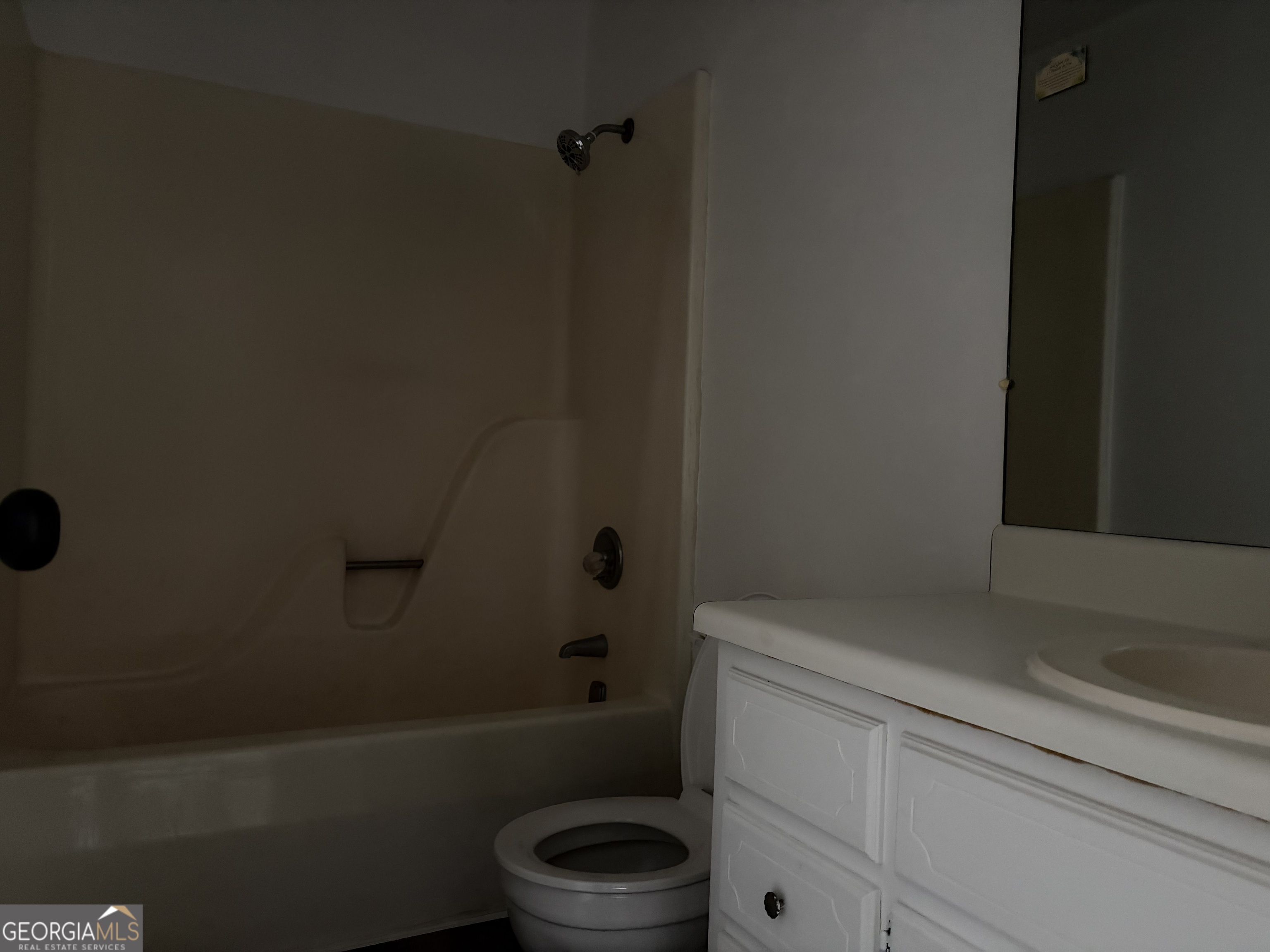 169 Ext N Jefferson Street Lyons, GA 30436 - Photo 9 of 18 a bathroom with a toilet and a bathtub