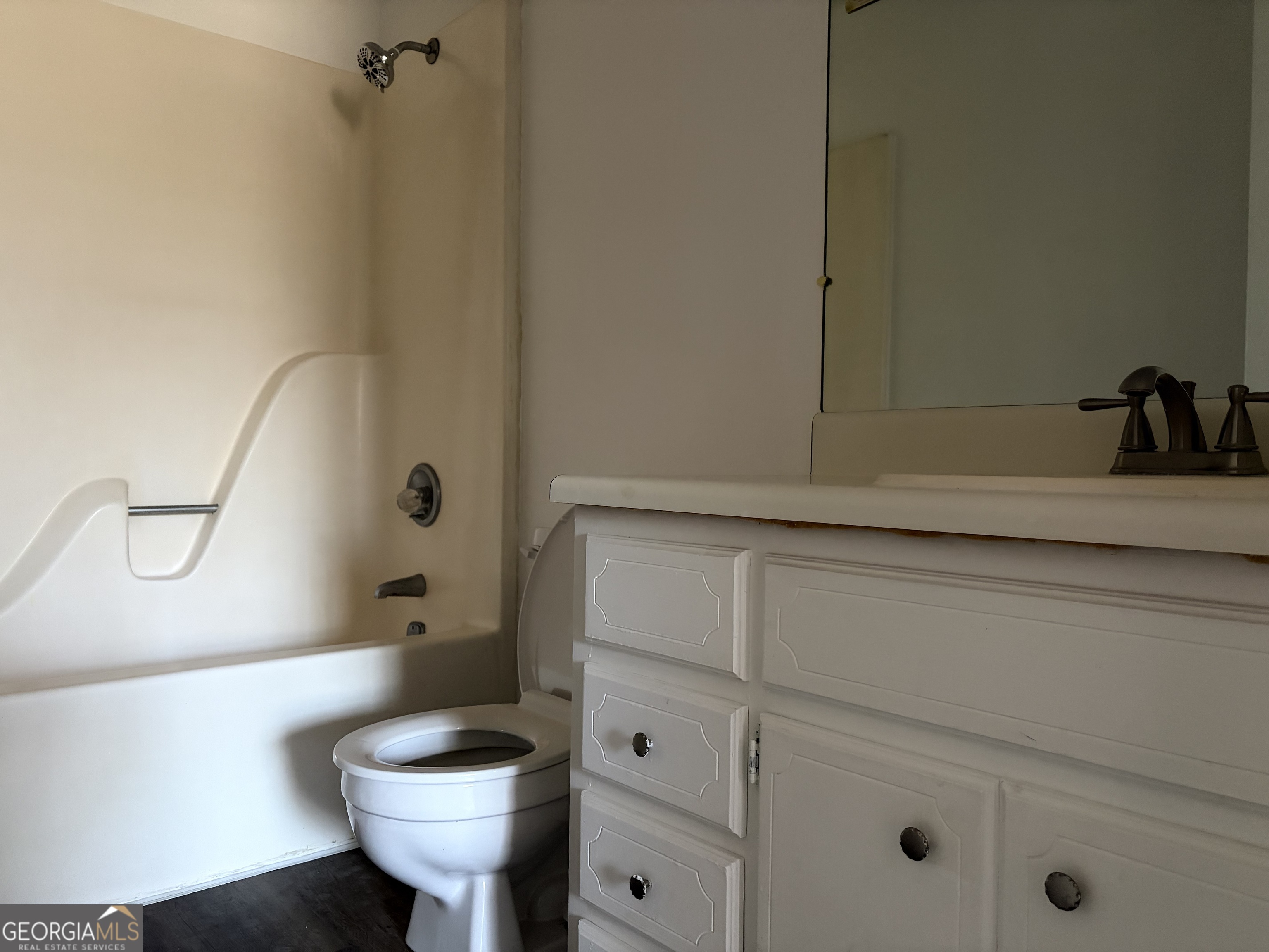 169 Ext N Jefferson Street Lyons, GA 30436 - Photo 10 of 18 a bathroom with a sink and a toilet