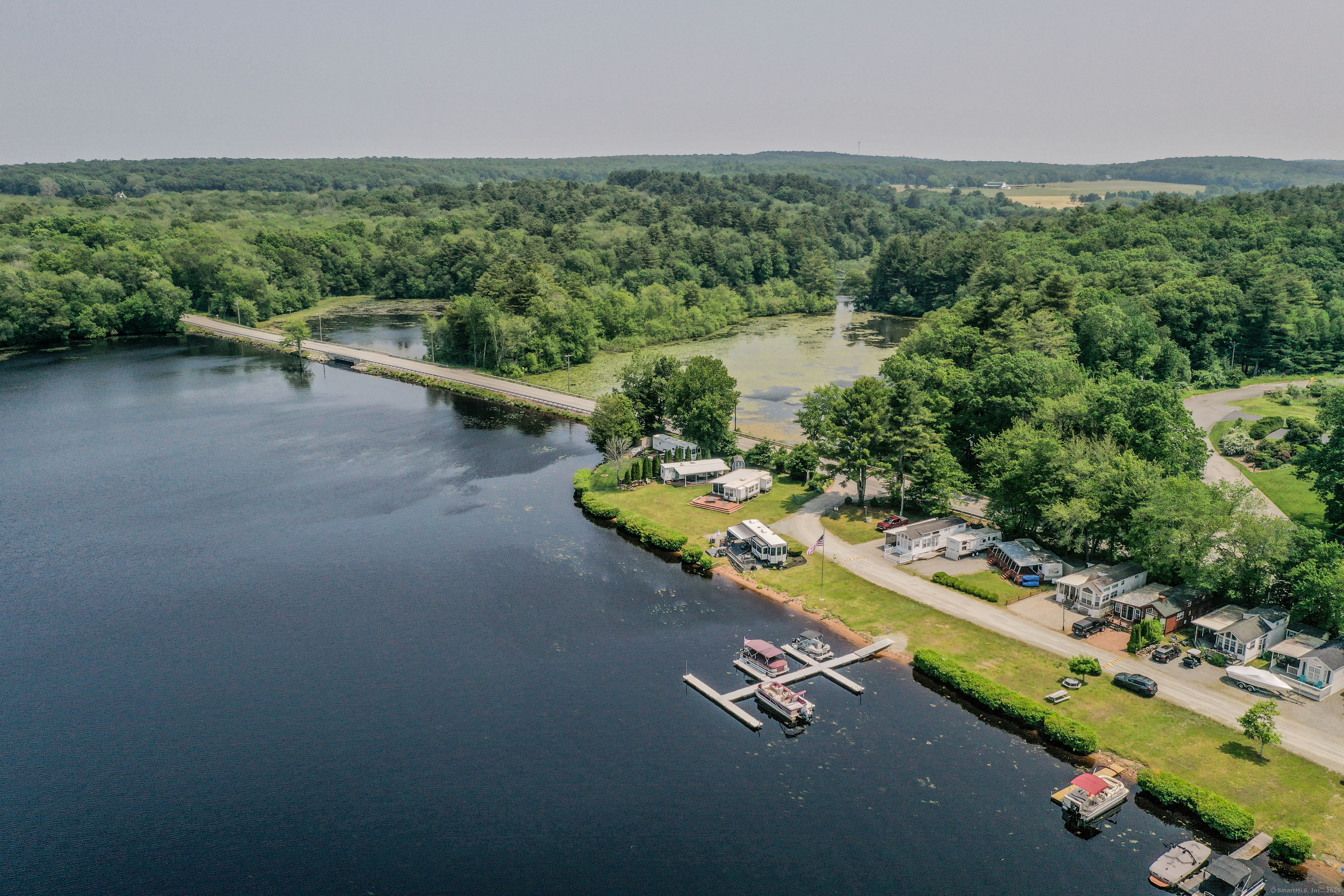 262 Shetucket Turnpike, Unit 2 Griswold, CT 06351 - Photo 21 of 26 an aerial view of a house with a yard basket ball court