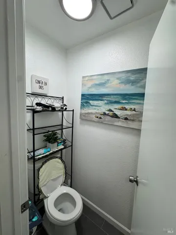 a bathroom with a toilet
