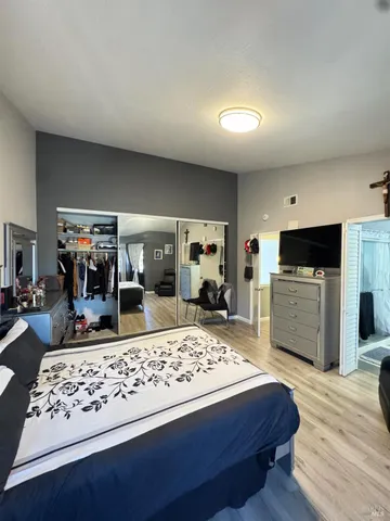 a bathroom with a sink a mirror and a bathtub