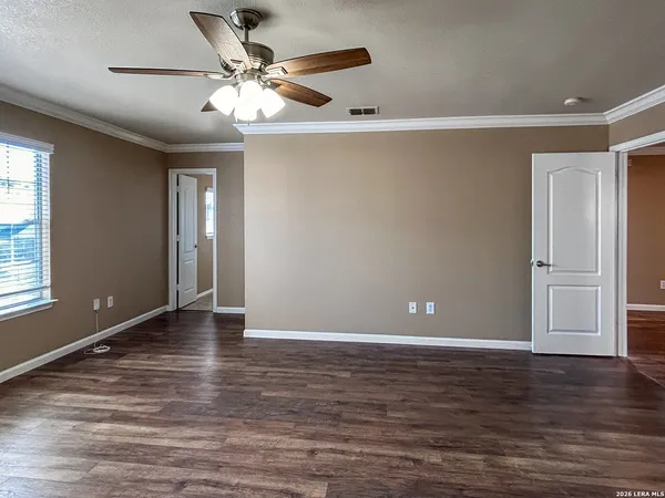 a view of a room with racks on the wall