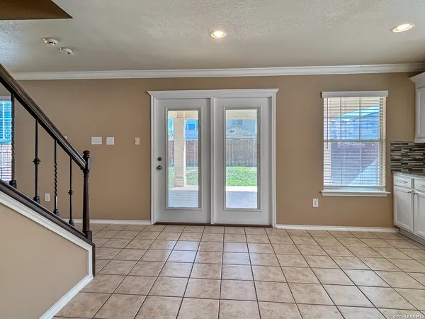 a view of an empty room with closet