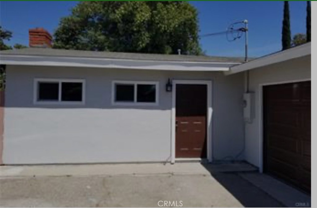 a view of a house with a garage