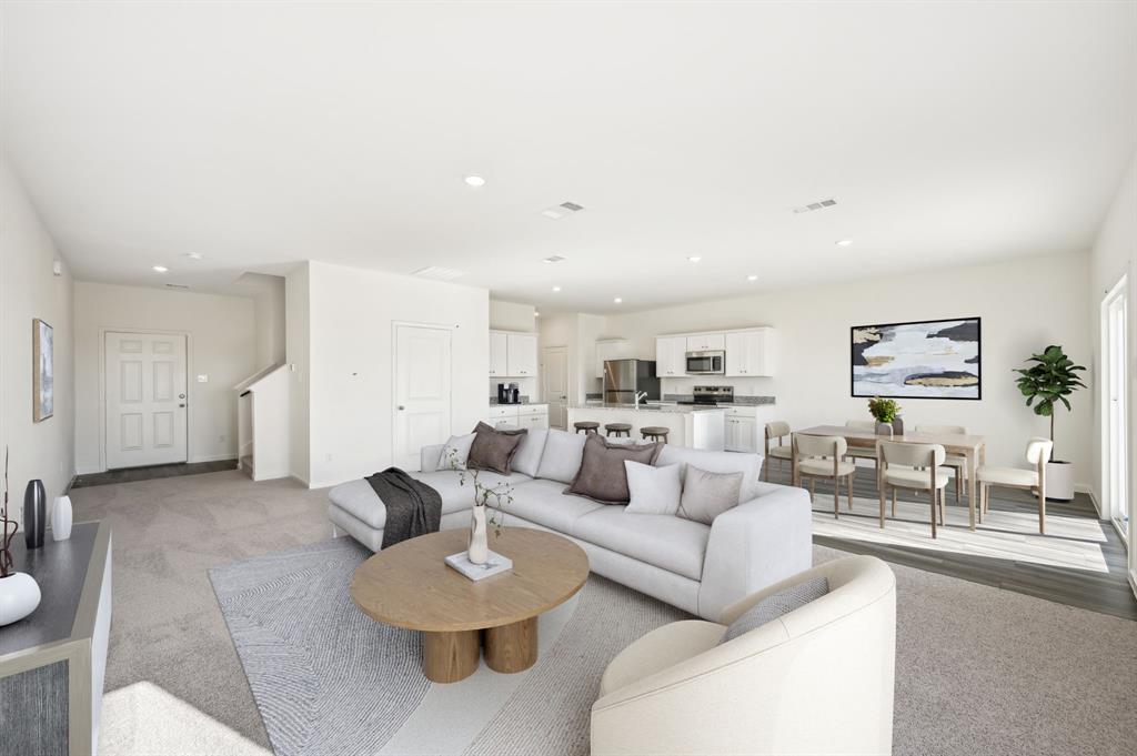 2403 States Street Princeton, TX 75407 - Photo 13 of 39 Living room with recessed lighting and light carpet