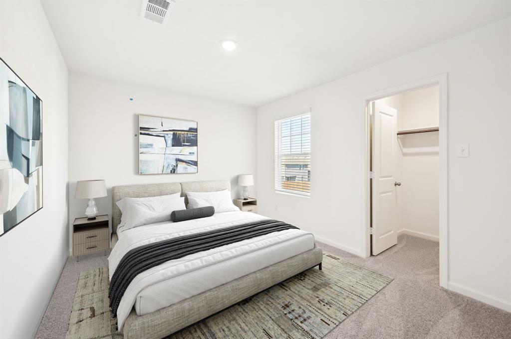 2403 States Street Princeton, TX 75407 - Photo 3 of 39 Bedroom with light colored carpet and a spacious closet