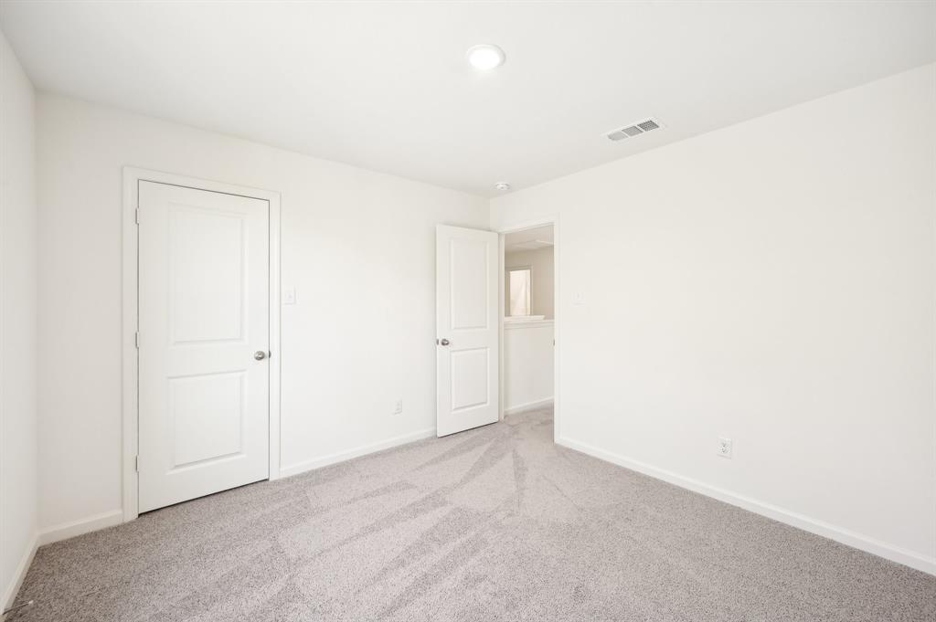 2403 States Street Princeton, TX 75407 - Photo 6 of 39 Unfurnished bedroom with carpet flooring and recessed lighting