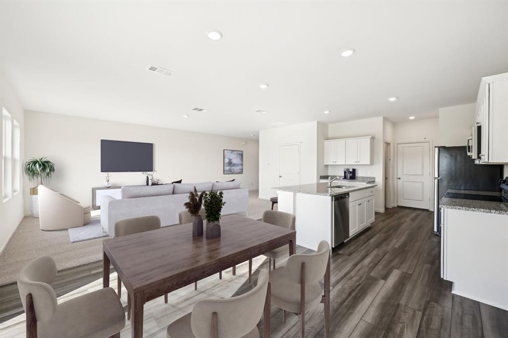 2403 States Street Princeton, TX 75407 - Photo 10 of 39 Dining room featuring recessed lighting and dark wood-style flooring