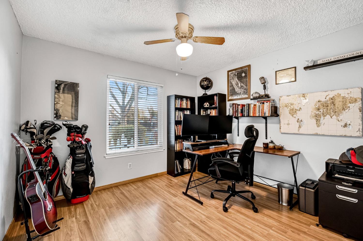 3120 West San Ramon Avenue Fresno, CA 93711 - Photo 18 of 36 a view of a workspace with furniture and a window