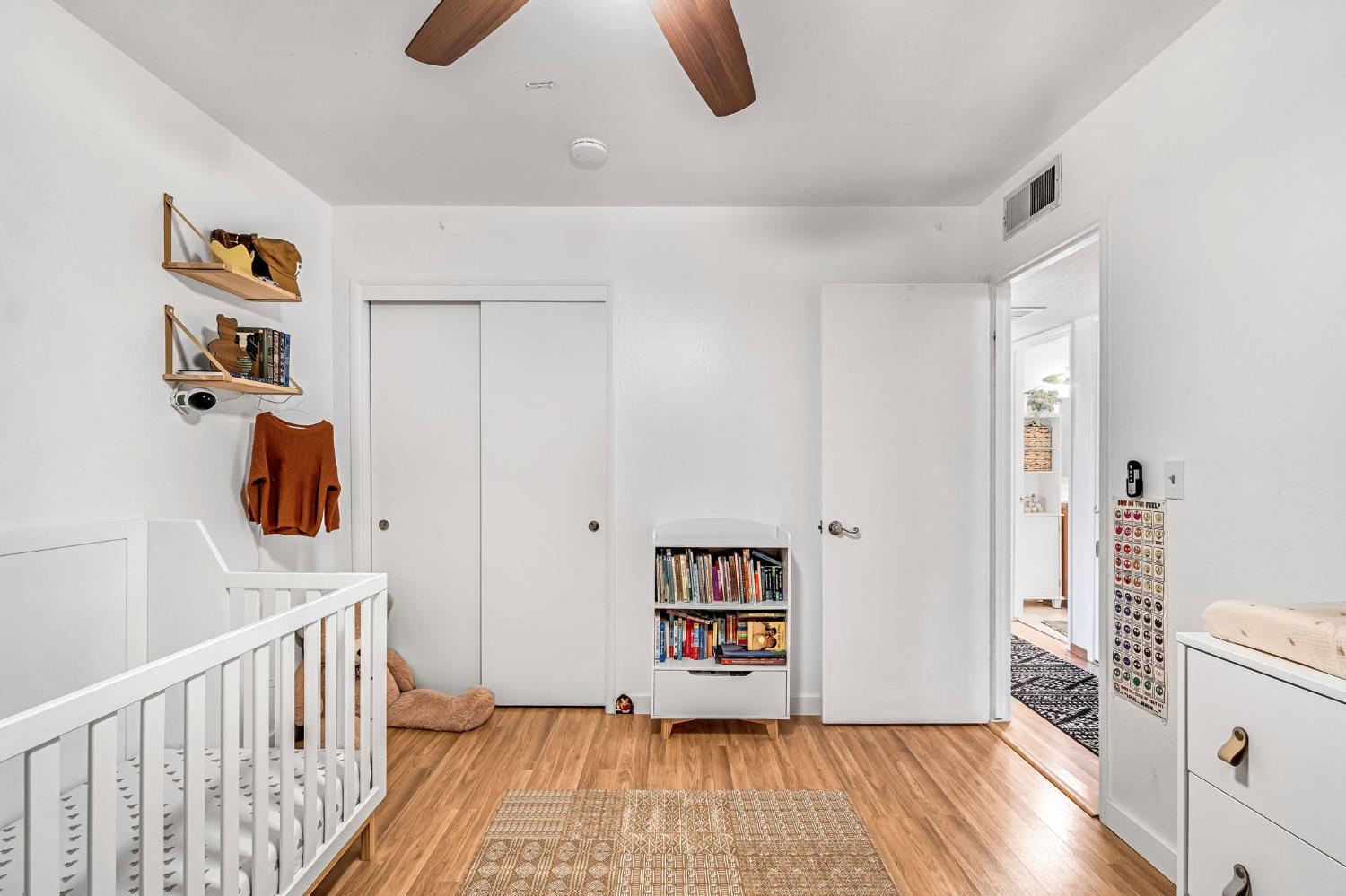 3120 West San Ramon Avenue Fresno, CA 93711 - Photo 22 of 36 a view of entryway with wooden floor