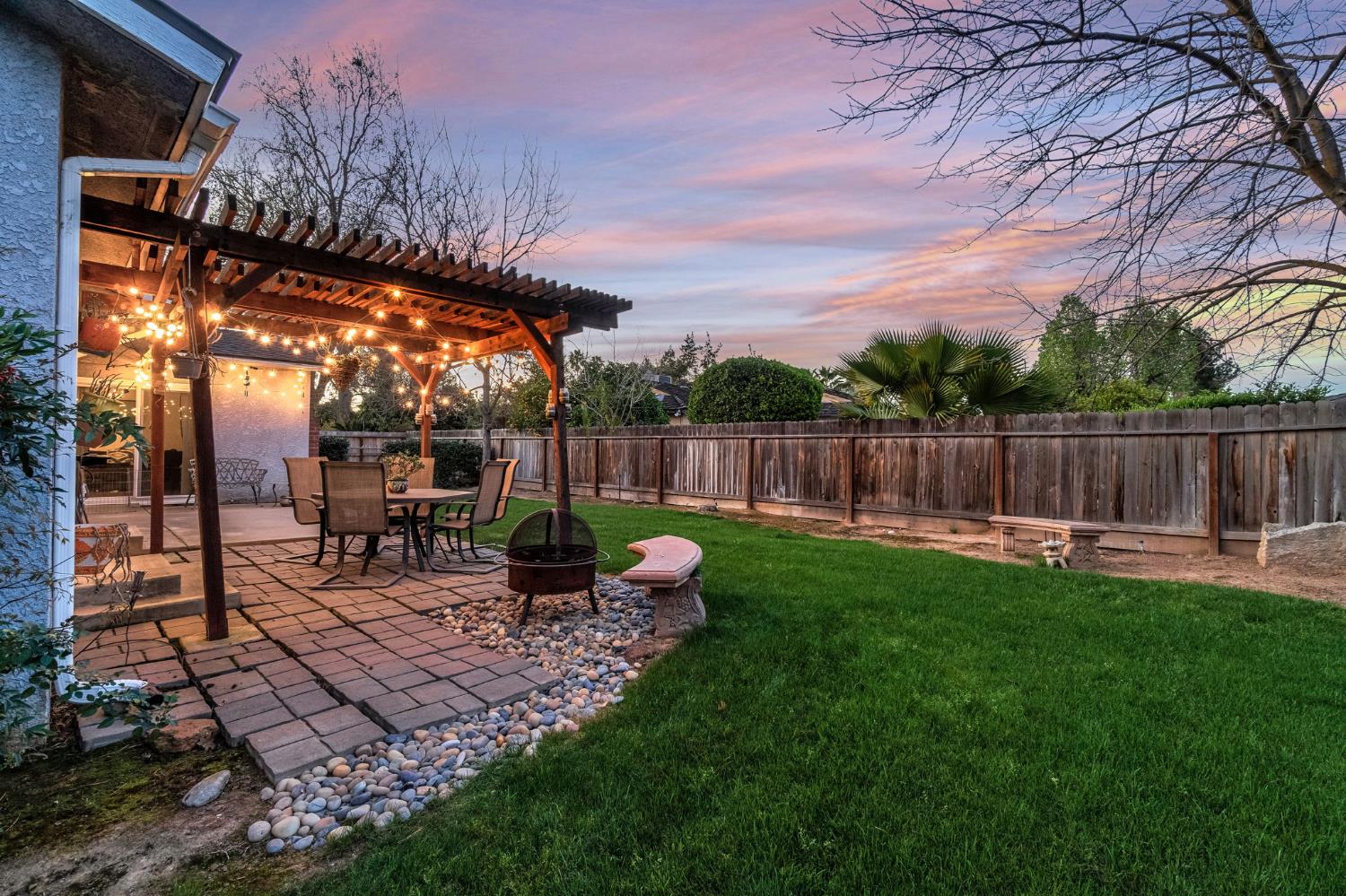 3120 West San Ramon Avenue Fresno, CA 93711 - Photo 32 of 36 a view of yard with patio and outdoor seating