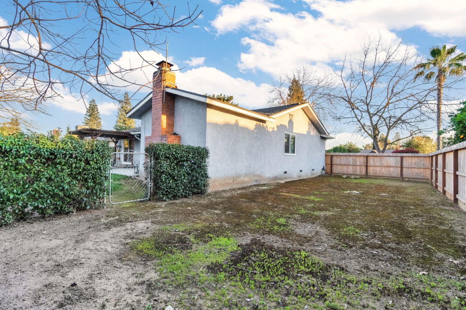 3120 West San Ramon Avenue Fresno, CA 93711 - Photo 36 of 36 a bathroom with a sink and mirror