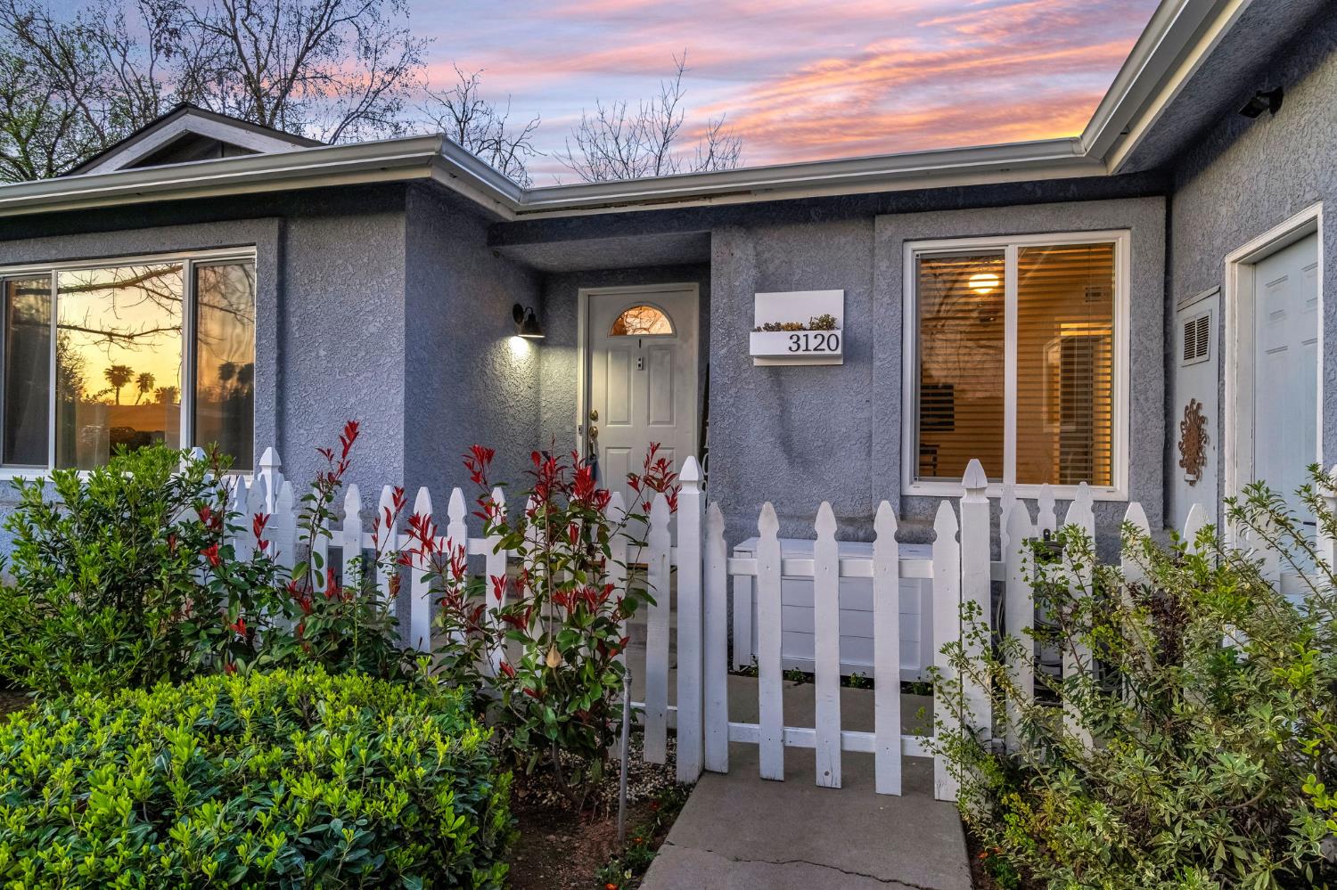 3120 West San Ramon Avenue Fresno, CA 93711 - Photo 4 of 36 a front view of a house with a porch