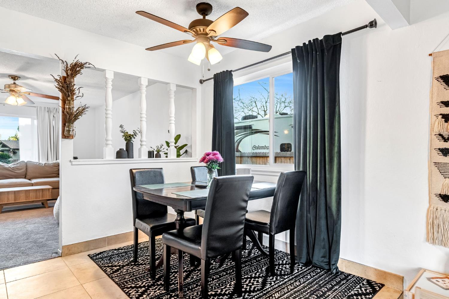 3120 West San Ramon Avenue Fresno, CA 93711 - Photo 9 of 36 a view of a dining room with furniture window and wooden floor