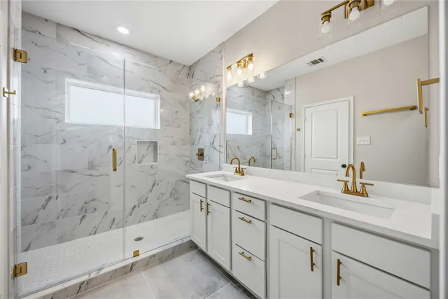 a bathroom with a sink a mirror and a bathtub
