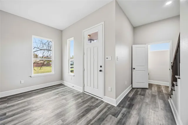 a view of an empty room and window
