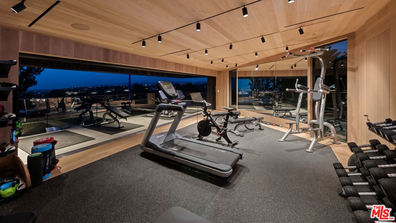 1663 Summitridge Drive Beverly Hills, CA 90210 - Photo 36 of 41 a view of a room with gym equipment