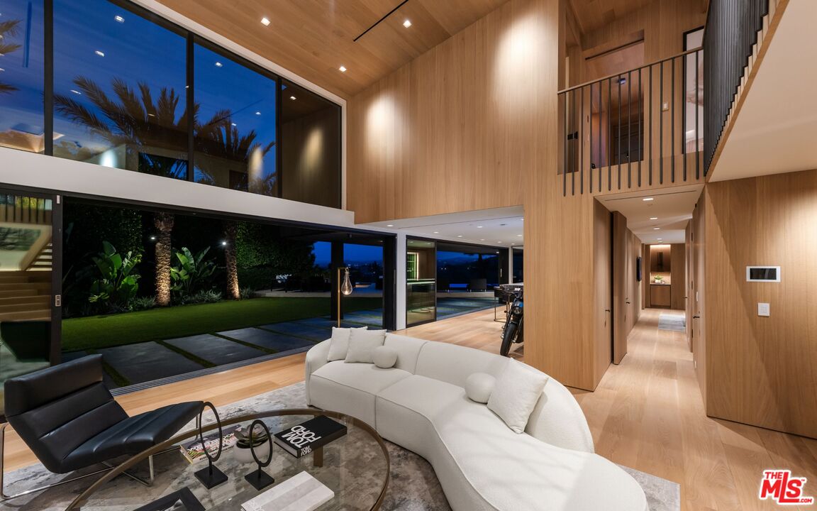 1663 Summitridge Drive Beverly Hills, CA 90210 - Photo 4 of 41 a outdoor space with patio lots of furniture and garden view