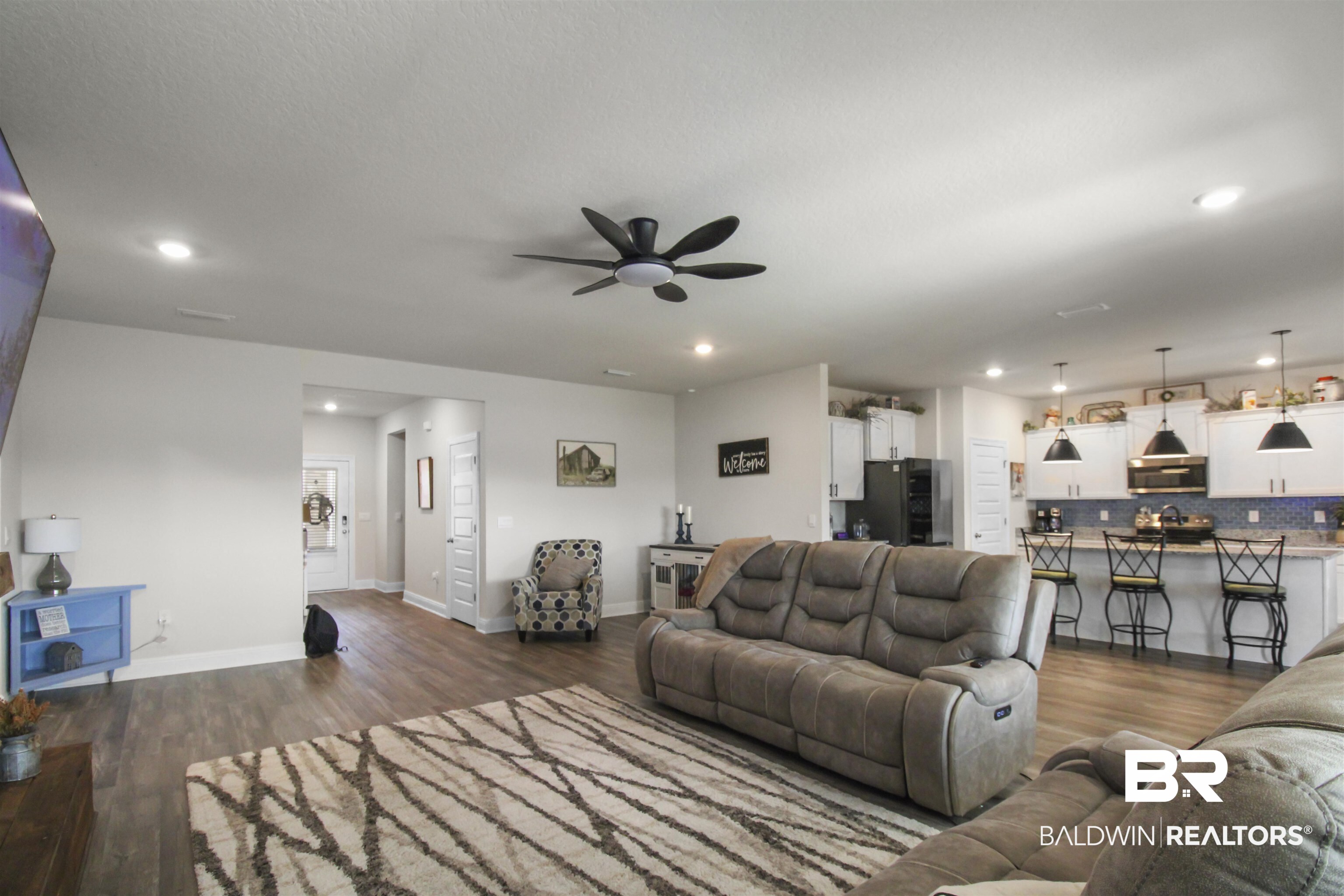 12523 Pheasant Run Elberta, AL 36530 - Photo 14 of 43 Living room featuring dark wood-type flooring, a ceiling fan, and recessed lighting