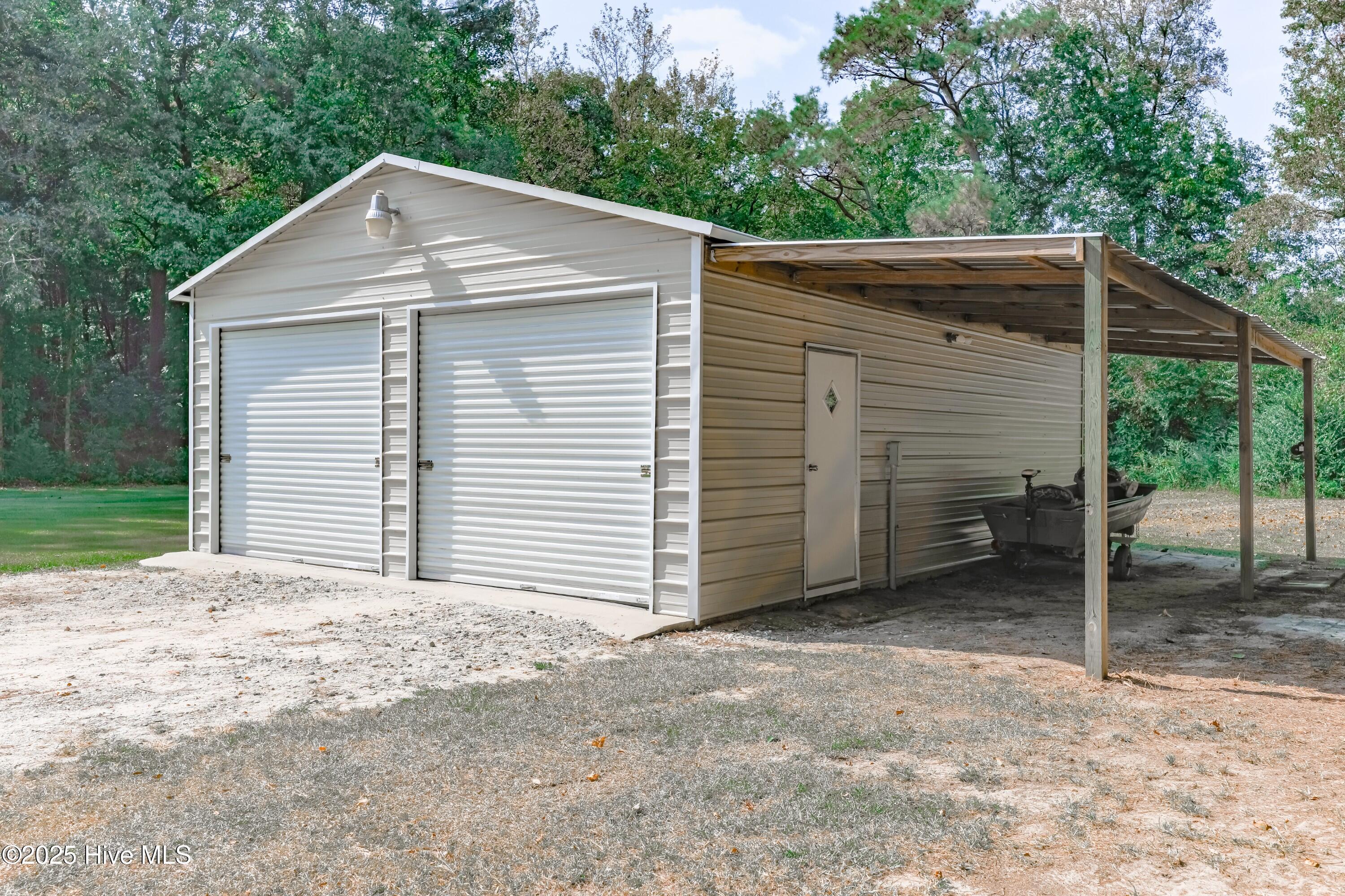 1110 South Dobson Chapel Road Magnolia, NC 28453 - Photo 14 of 46 Building 22 x 30 with a 9 ft shelter on side