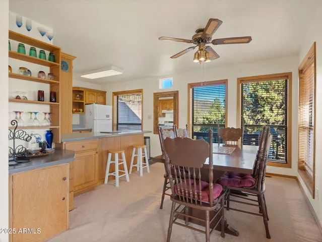 a kitchen with stainless steel appliances granite countertop a stove and a sink