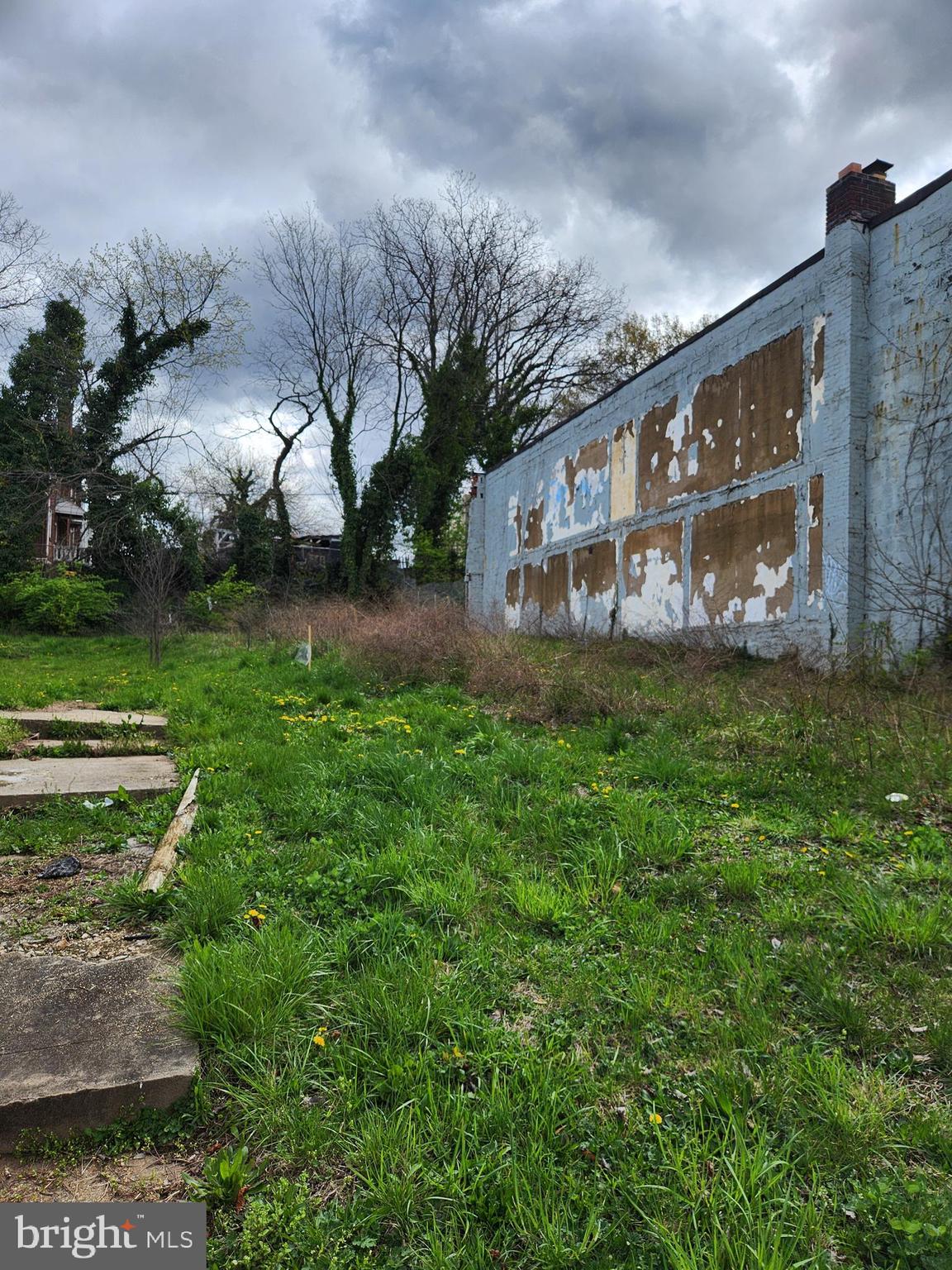 4968 Benning Road Southeast Washington, DC 20019 - Photo 4 of 4 front view of a house with a yard